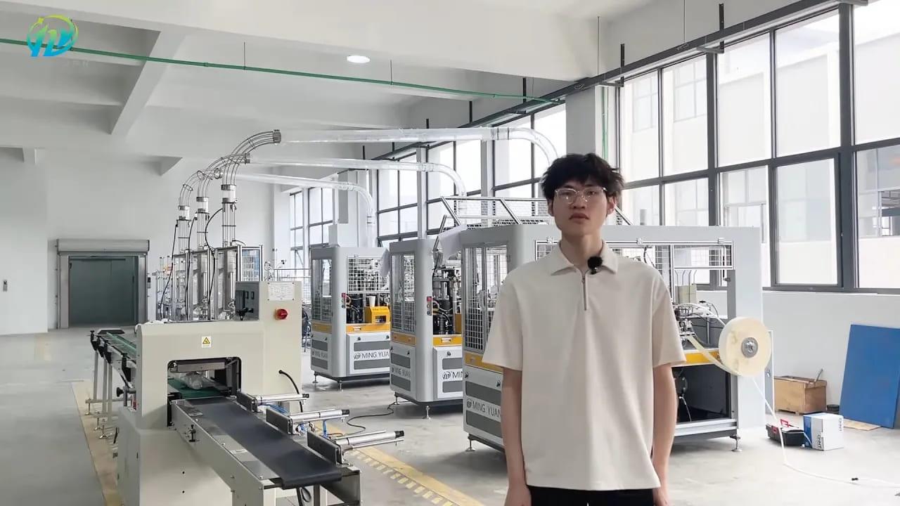 介绍三台 OCM12 纸杯机连接 MY-450X 包装机的连接解决方案